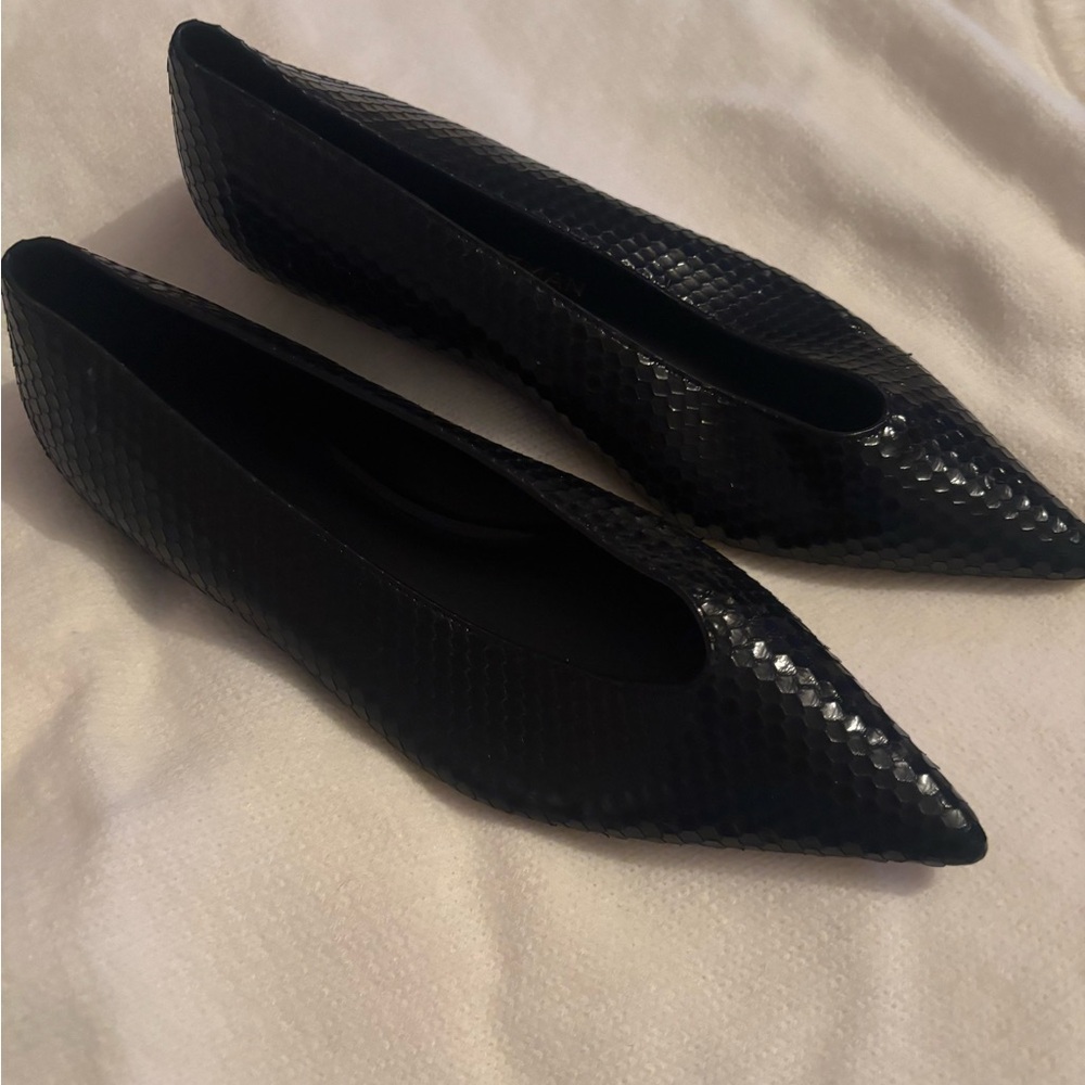 Stuart Weitzman Black Textured Flats skin